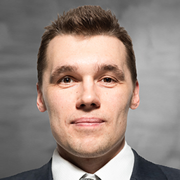 Professional headshot of Jakub Sulimierski, CFA