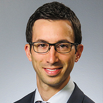 Professional headshot of Joel P. Schneider